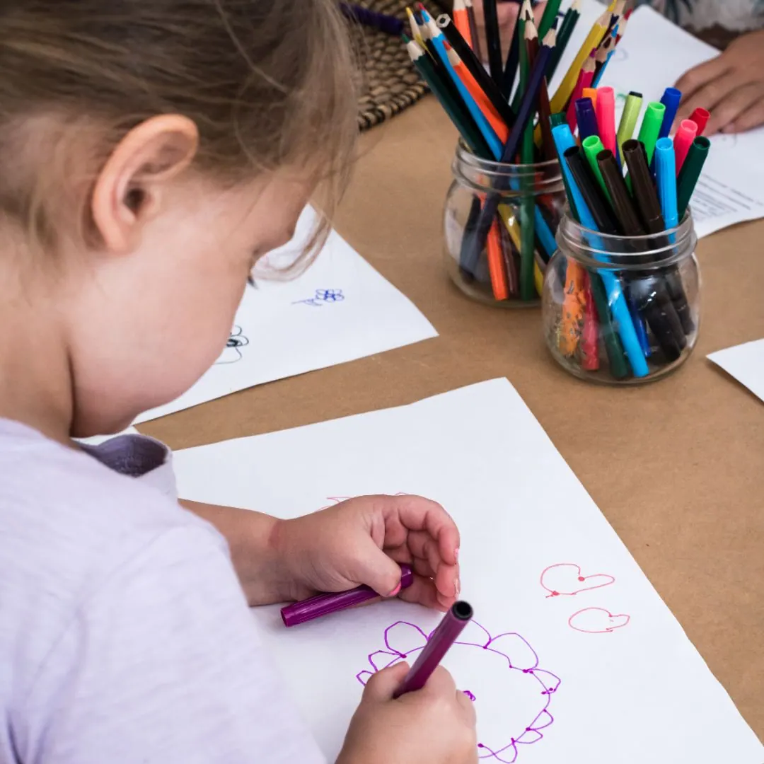 Children engaged in creative art and play-based learning