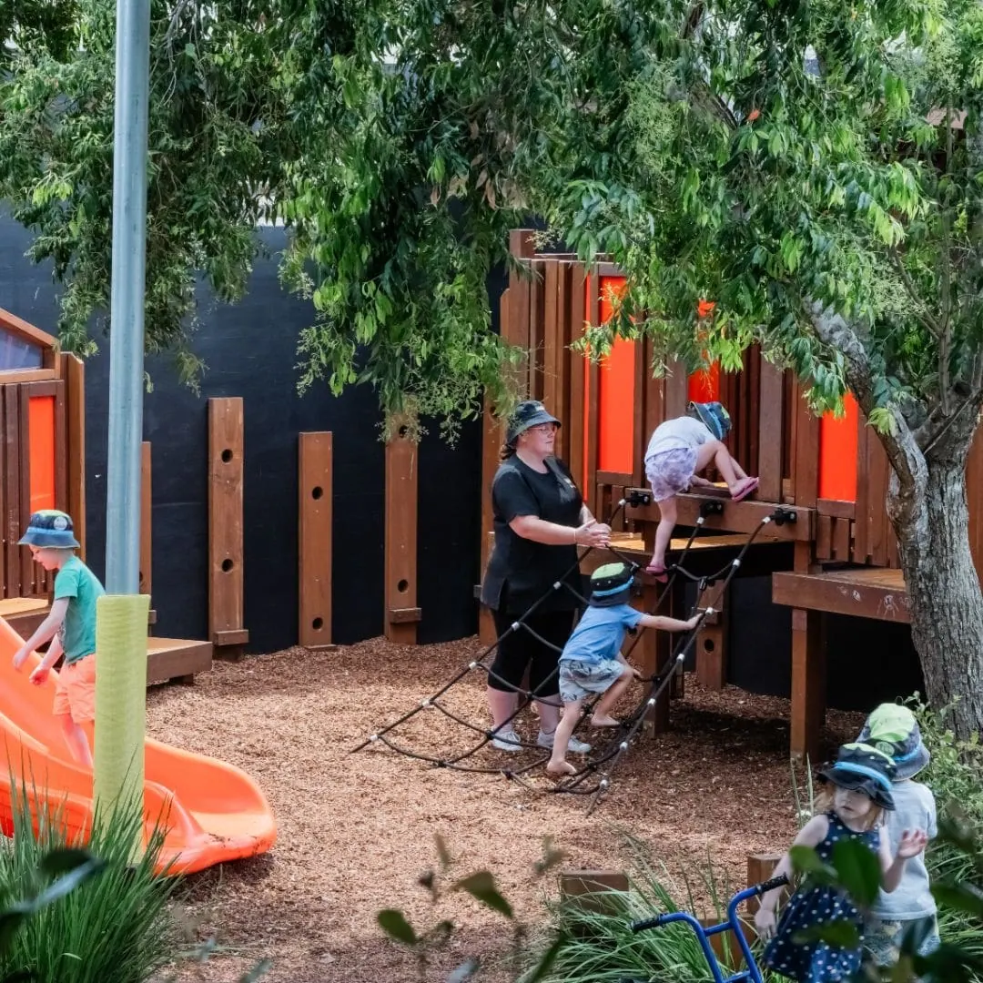 Children's cubby house made from reclaimed timber in the garden